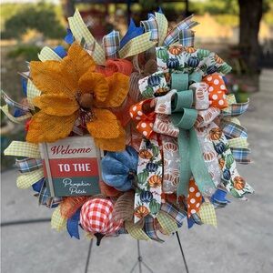 Festive Autumn Wreath with Orange and Blue Accents